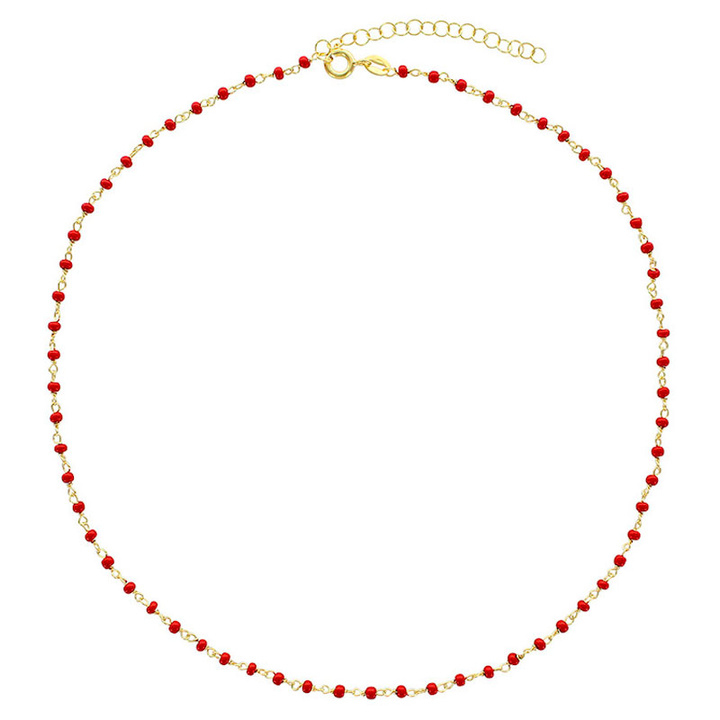 Collier doré perles rouges