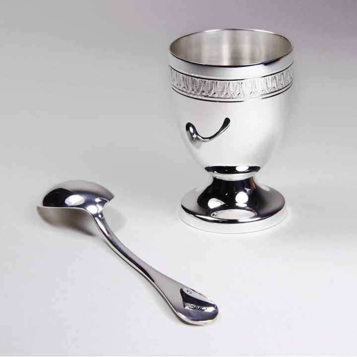 Empire egg cup and its egg spoon